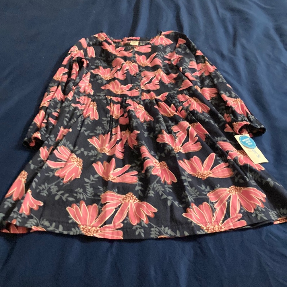 Girls flower dress. Brand new.